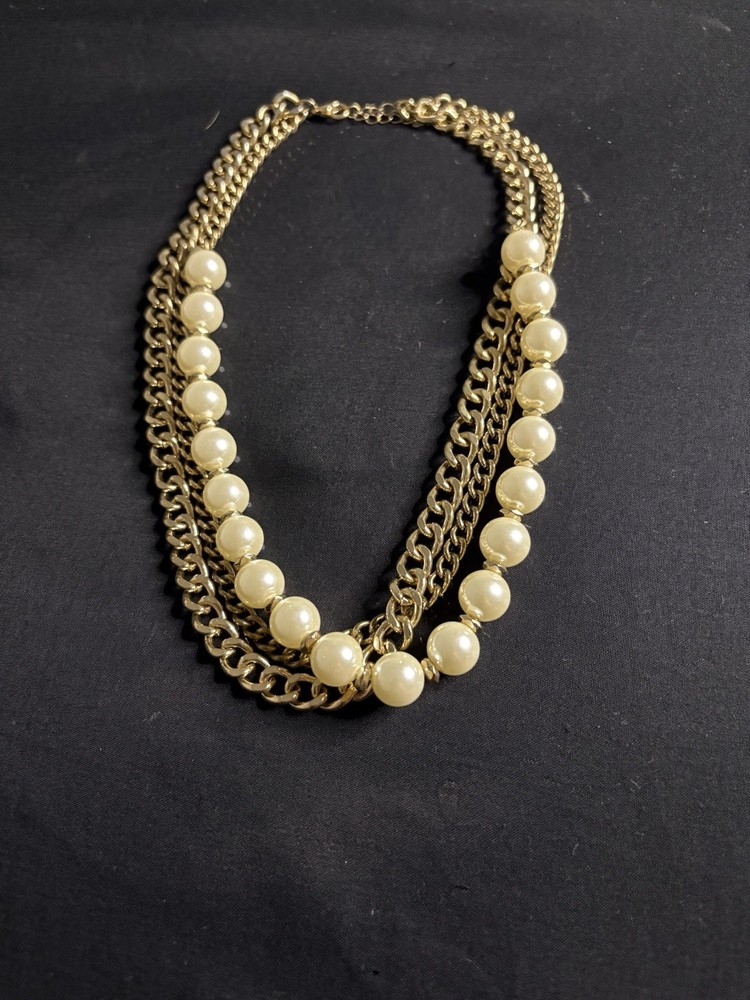 Elegant gold and white pearl layered necklace for women #necklace #jewelry #pearls #goldnecklace