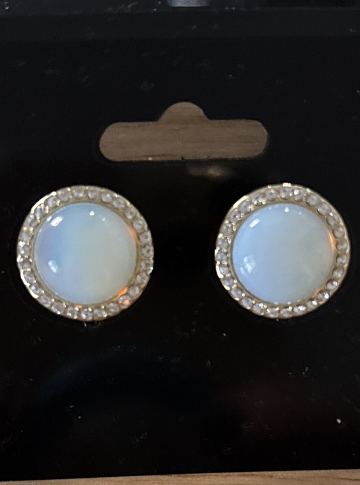 Round Halo Simulated White Opal & Cubic Zirconia Silver Stud Earrings. Reflects