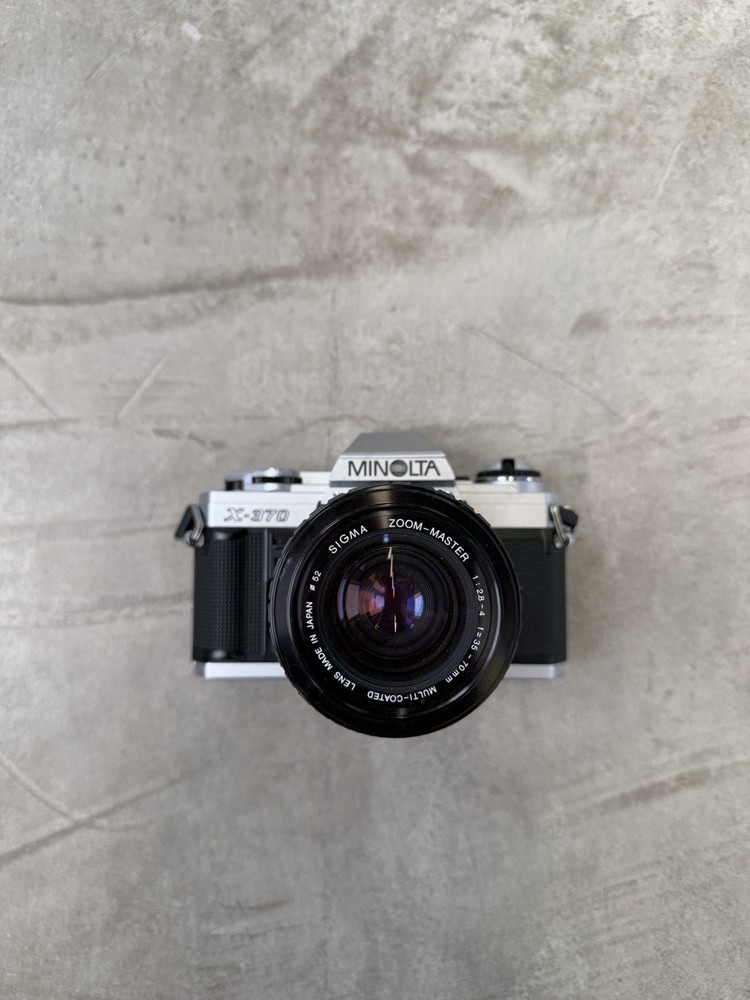 Minolta X-370 35mm SLR Film Camera, Strap & 70mm Lens Untested