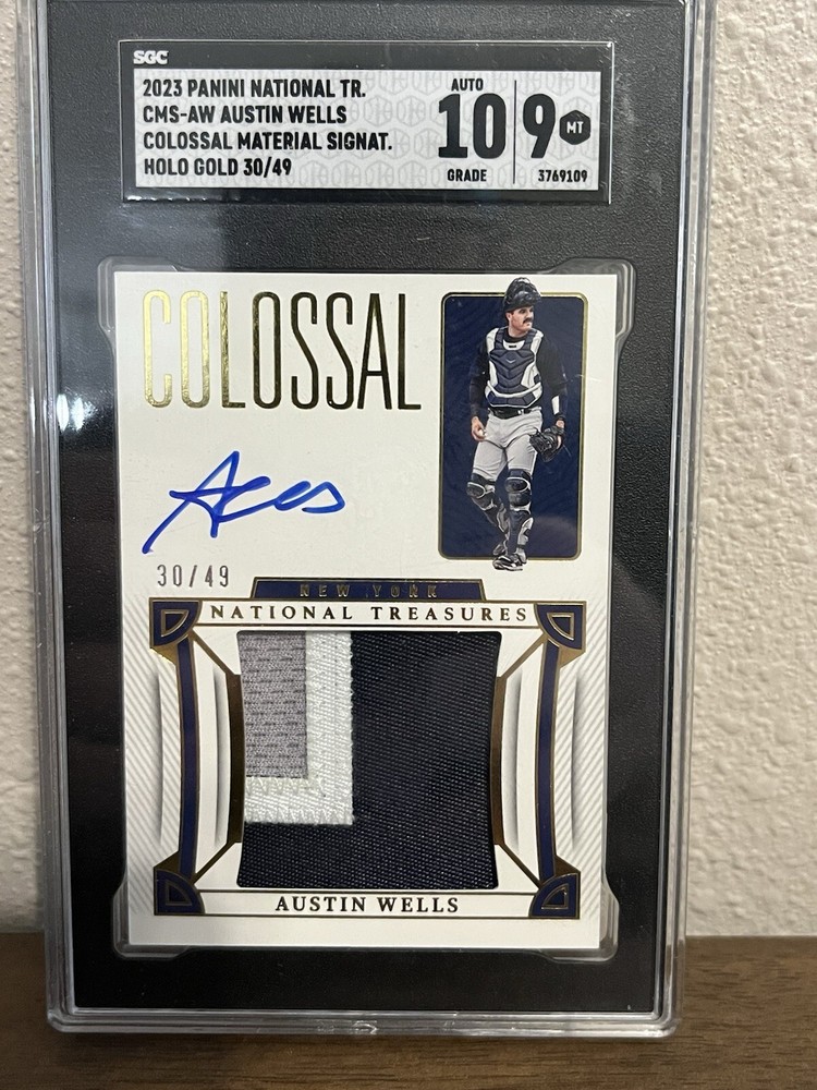 Austin Wells 2023 Panini N T Colossal Material Signatures #CMS-AW /49