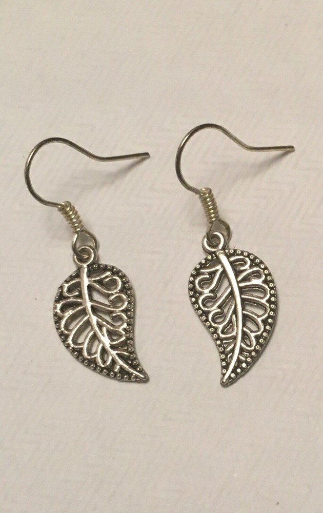 lovely filigree leaf Earrings In Silver Plate.drop dangle
