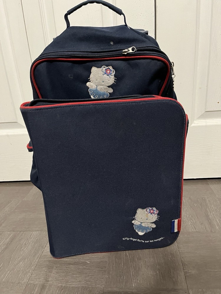 Vintage Hello Kitty Zip Binder And Rolling Backpack. 2002 Dark Blue