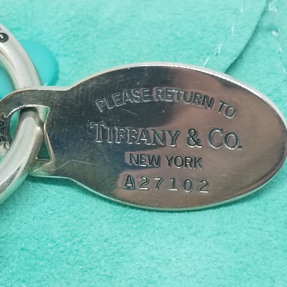 Vintage Tiffany & Co. Sterling Silver Round Key Charm chain 9.7g. Oval tag