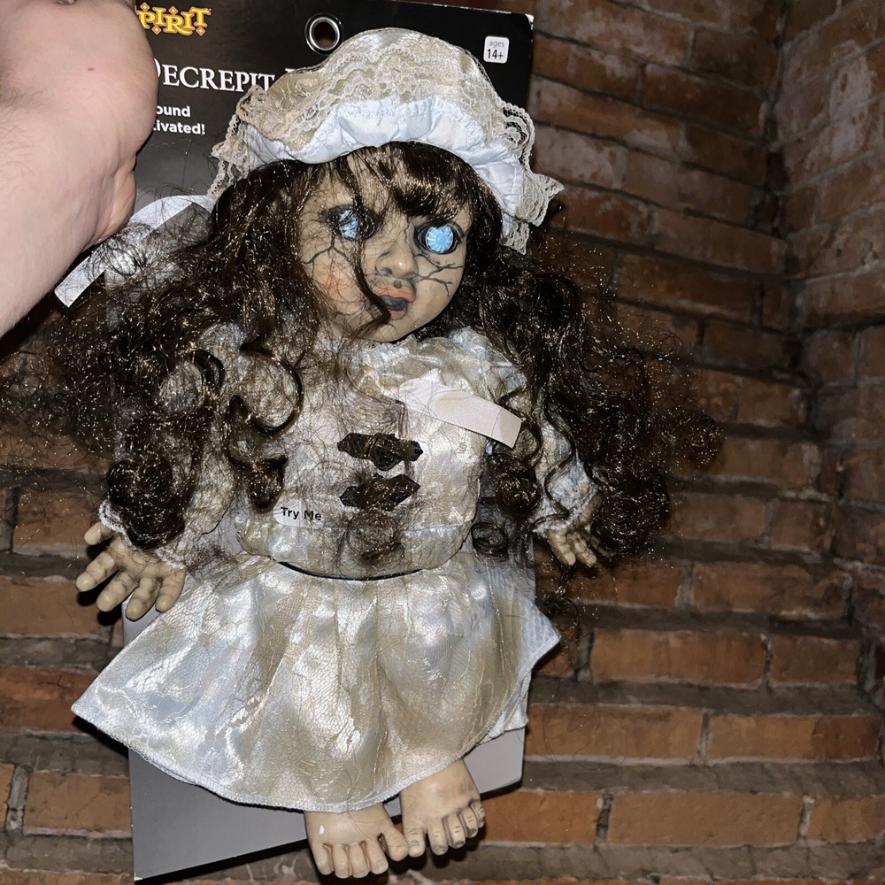 Spirit Halloween Decrepit Haunted Doll Prop
