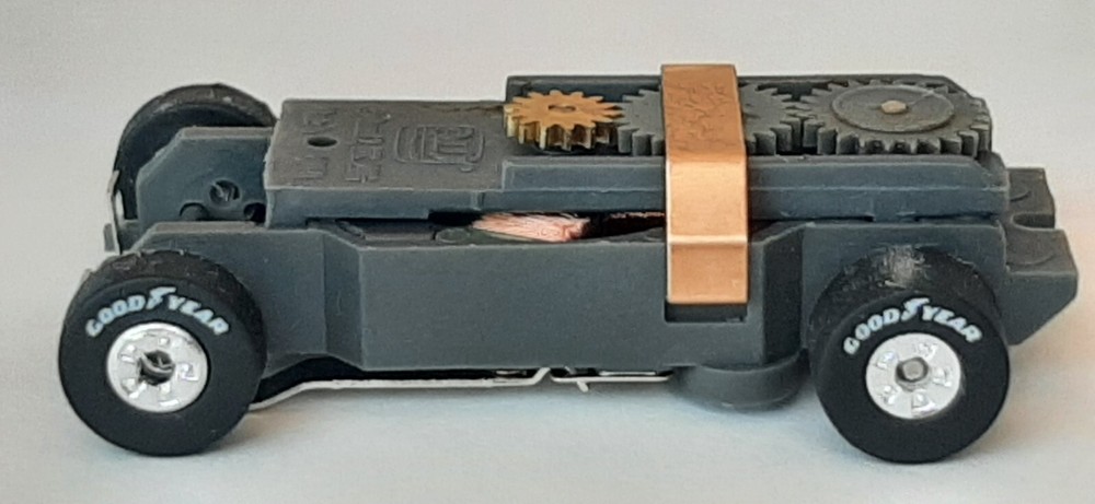 New Auto World Ultra G Replacement LWB Thunderjet HO Slot Car Chassis Good Year-image