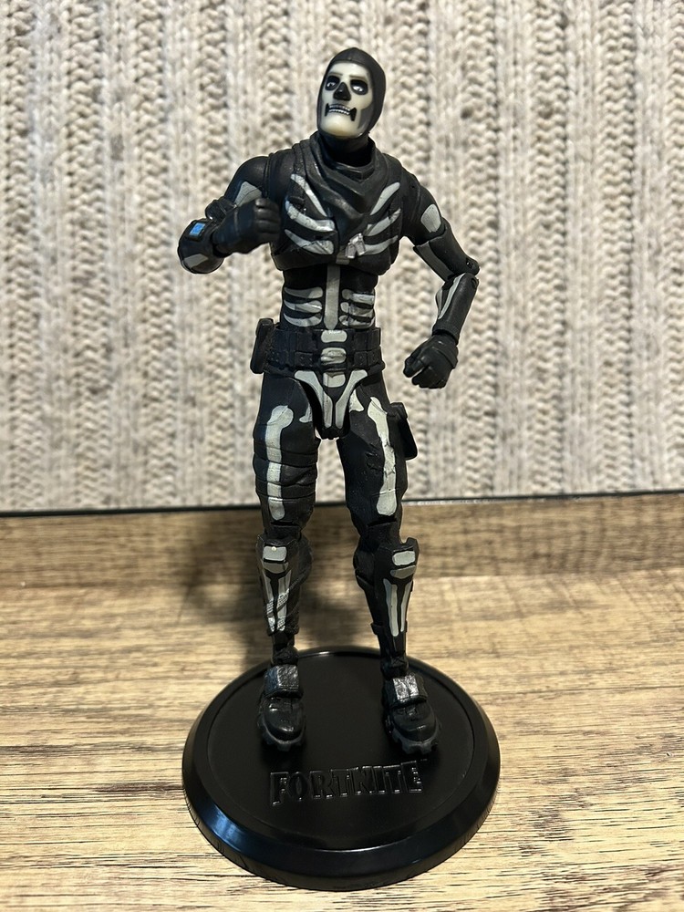 Fortnite Glow-in-the-Dark Skull Trooper 7-Inch Action Figure with Stand  