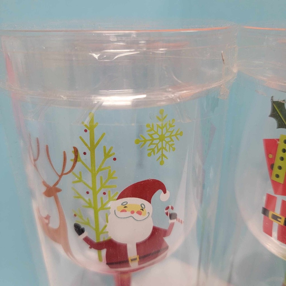 Festive Christmas Wine Glasses with Happy Holidays and Santa Designs  