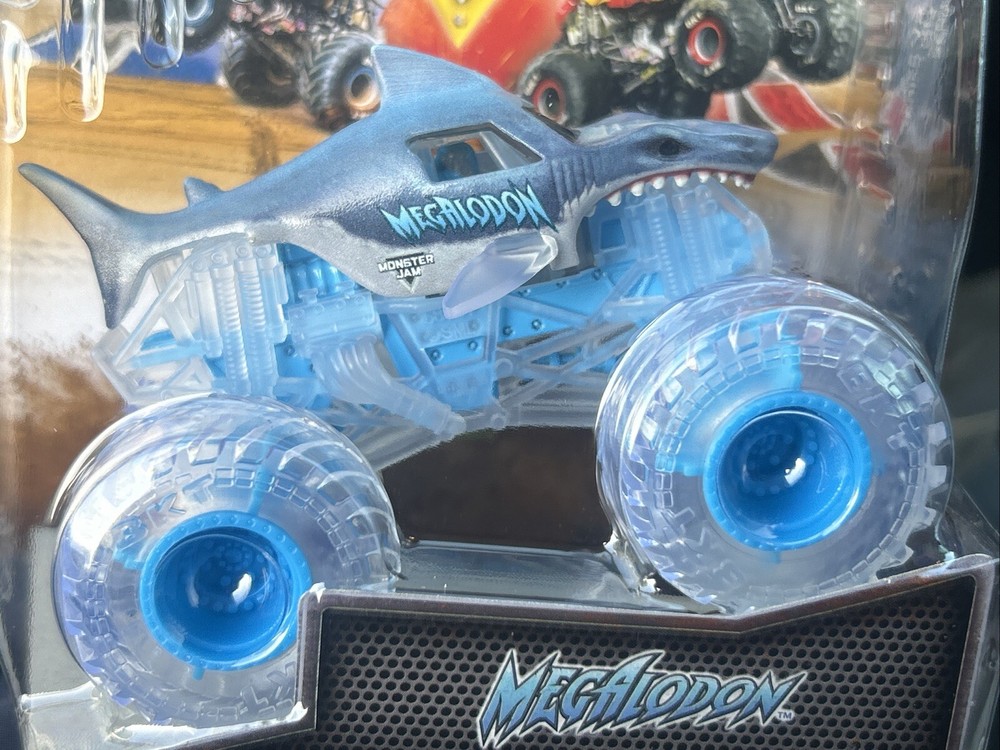 2024 MONSTER JAM TRUCKS VHTF NEW  CHASE TRUCK “” MEGALODON “” CLEAR WHEELS