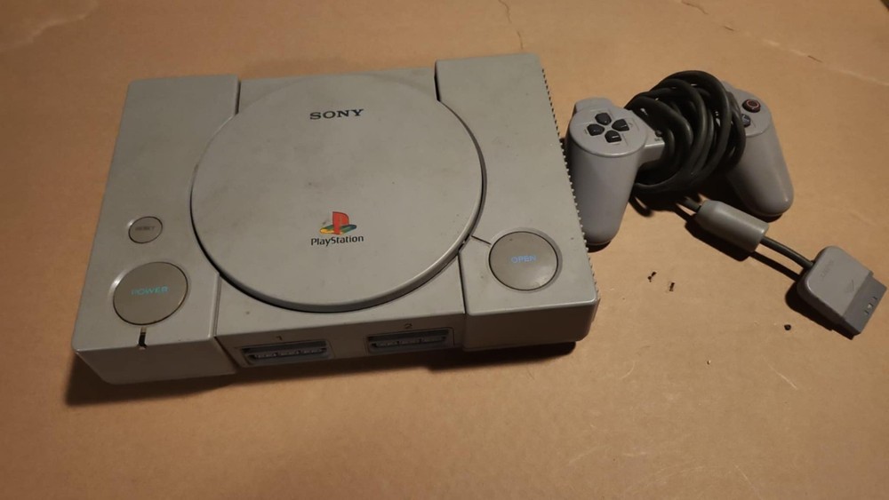 Sony PlayStation Gaming Console with Wireless Controller