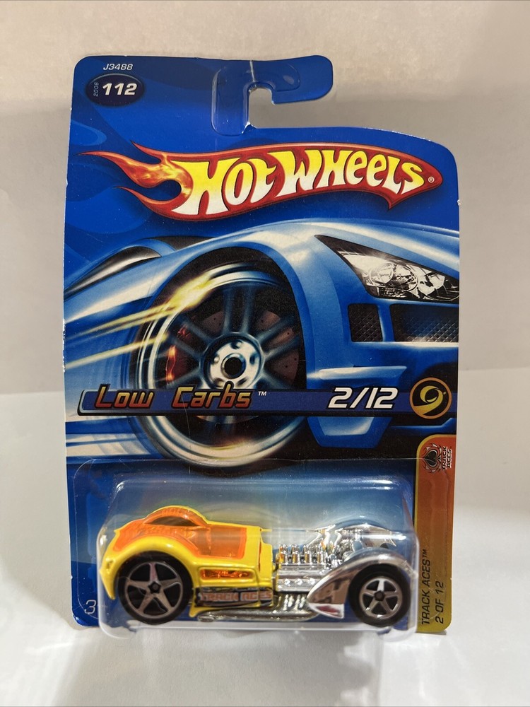 🌟💫 Rare Collectible Gift Yellow 2006 HotWheels Track Aces 112 Low Carbs 2/12
