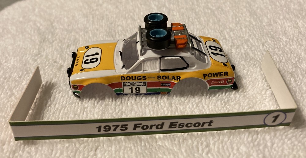 AUTOWORLD AW RALLY WORLD STAGE 1975 FORD ESCORT AURORA AFX TYPE HO SLOT CAR BODY