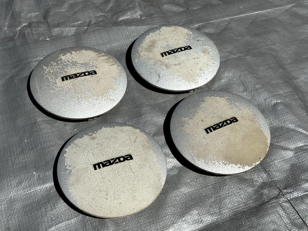 Mazda Miata 90-97 OEM Daisy EIM Wheel Hub Center Cap Set - 4 Pieces