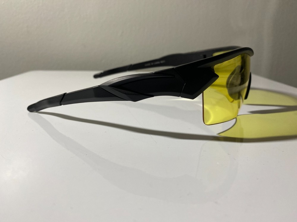 Men's black frame cycling sunglasses with yellow lenses