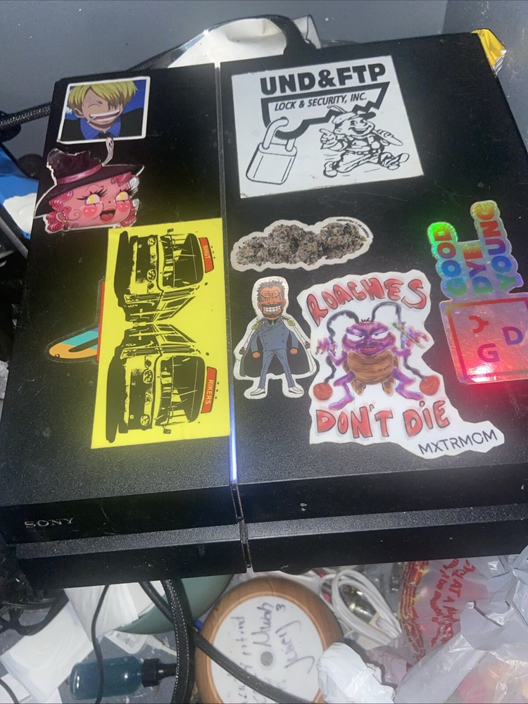 Sony PlayStation 4 500GB Jet Black Console with Wireless Controller