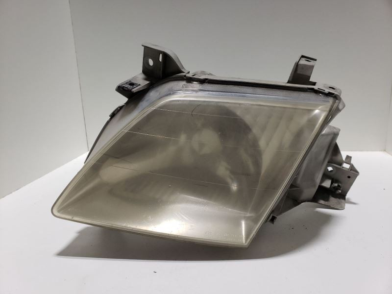 2000-2001 Mazda MPV Driver Side Headlight Assembly 379977  