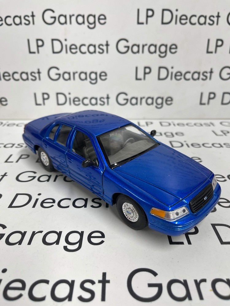 WELLY 2005 Ford Crown Victoria Blue Police Interceptor 1:27 Diecast