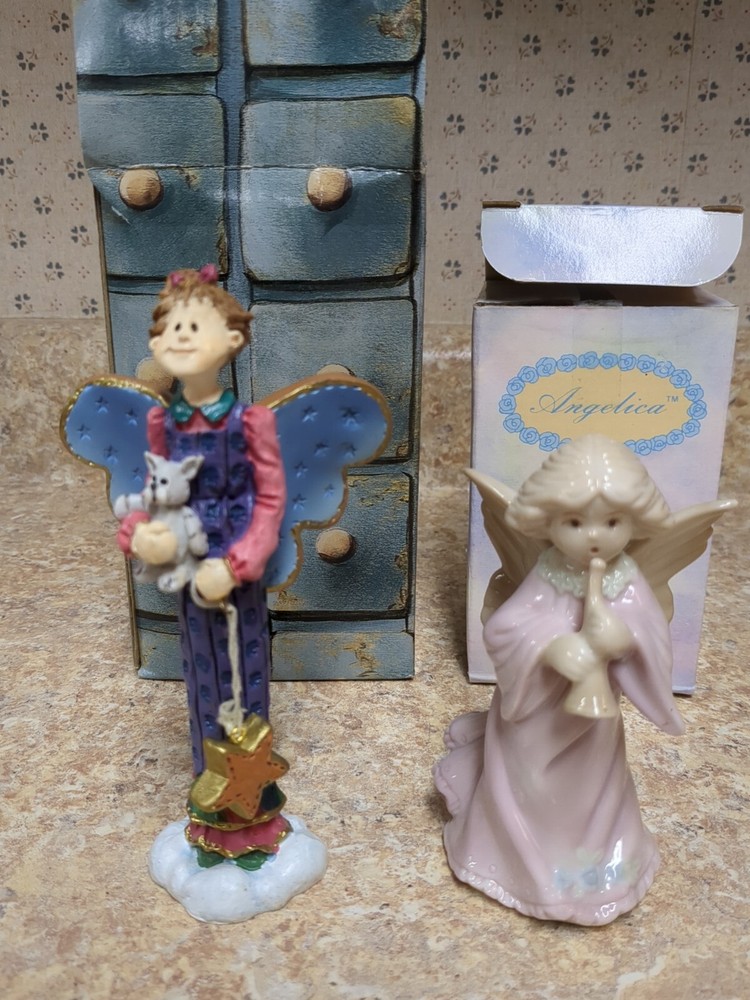 Two Russ Berrie Figurines--Heavensent and Angel Playing Horn