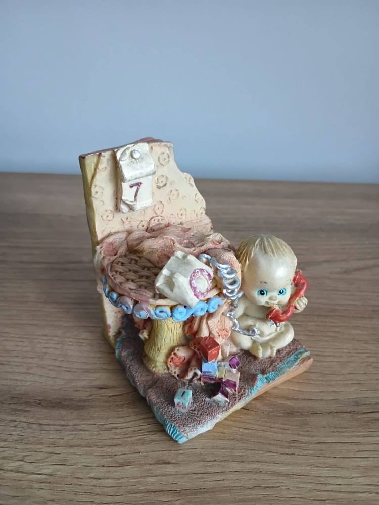 Vintage Baby Figurines for Collectors and Decor Enthusiasts
