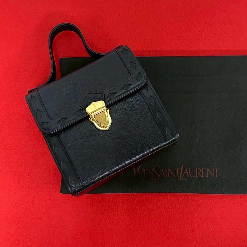 YSL Yves Saint Laurent black cut-out leather handbag pre-owned excellent condition