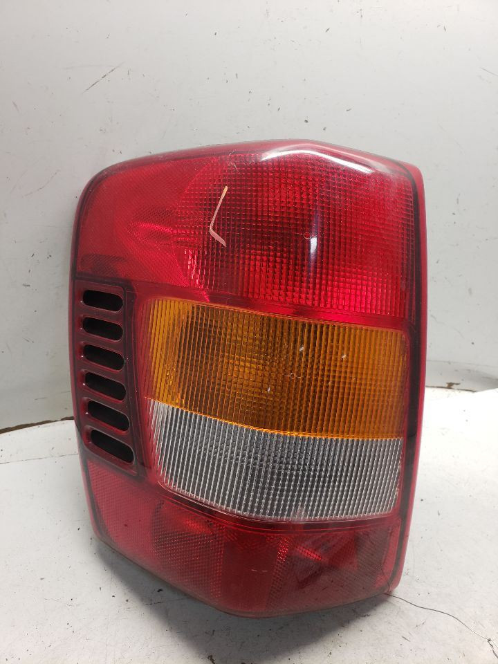 Driver Left Tail Light Fits 03-04 GRAND CHEROKEE 1330751