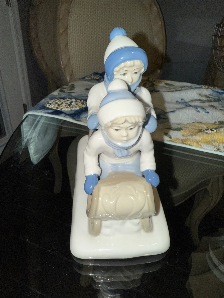 1992 Porcelain Figurine of Children on Sled Mexico Paul Sebastian