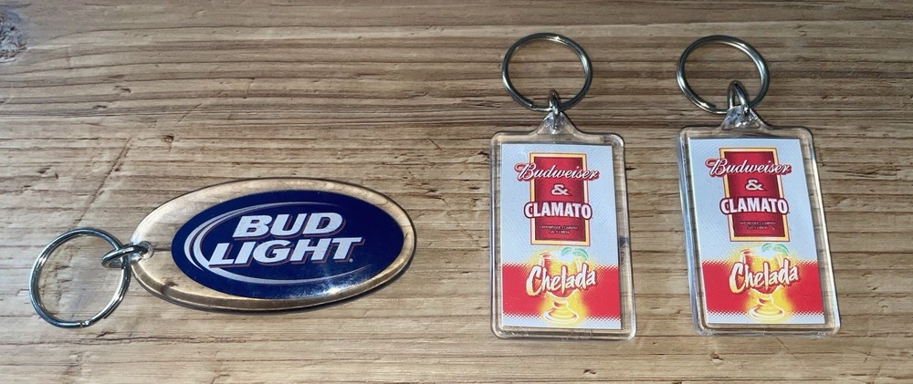 3 Used Key Chains. 1 Bud Light 2 Bud Light/ Budweiser Clamato Chelada Key Chains