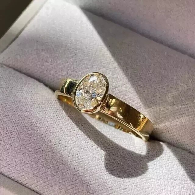 Fancy Solitaire Bezel Ring 14K Yellow Gold Plated 2Ct Oval Cut Simulated Diamond