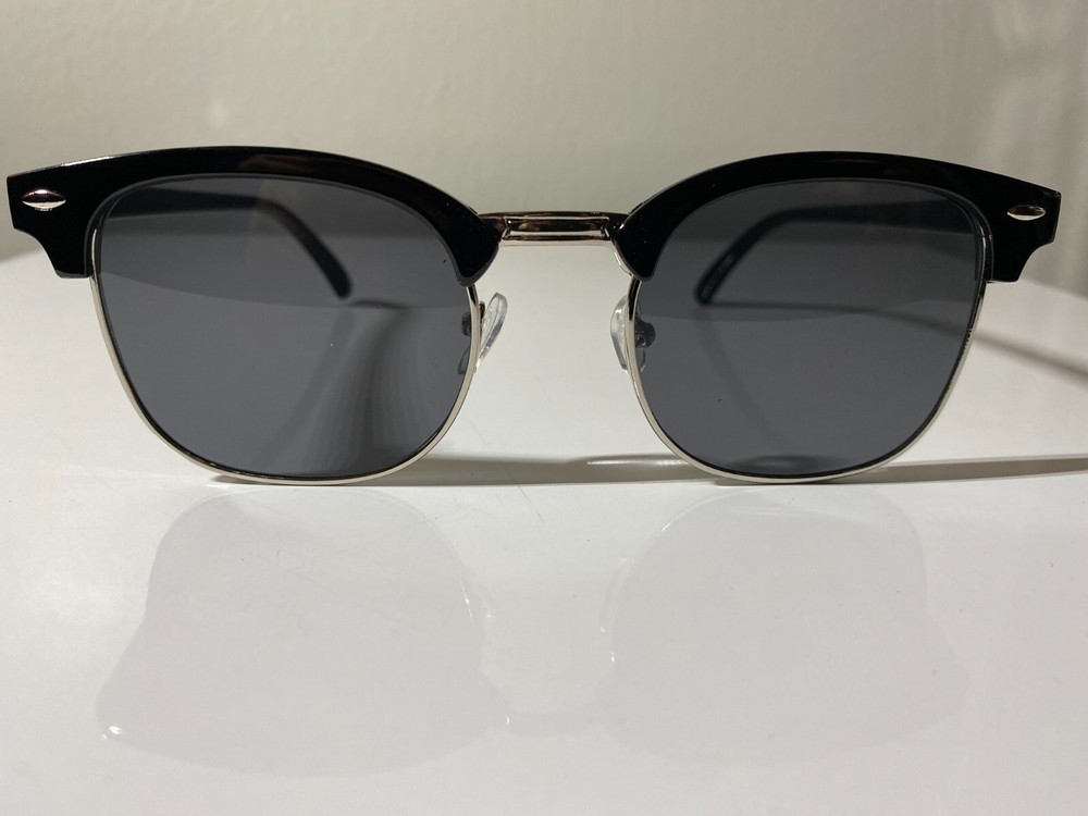 Blues Brothers-inspired men's sunglasses featuring a sleek black and silver frame with durable black lenses for ultimate style and protection