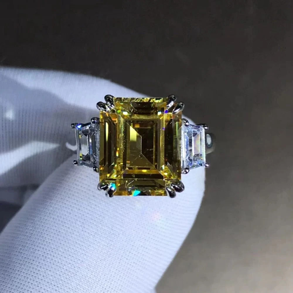 5 Carat Vivid Yellow Moissanite Emerald Cut Three-Stone Ring in Platinum Vermeil