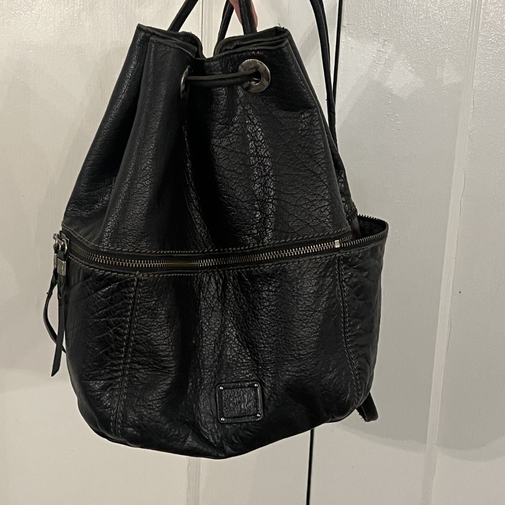 The Sak Black Leather Camino Boho Hobo Backpack with Multiple Pockets