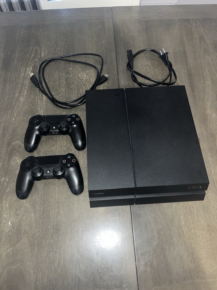 Sony PlayStation 4 Black Console with 2 DualShock 4 Controllers & Cables