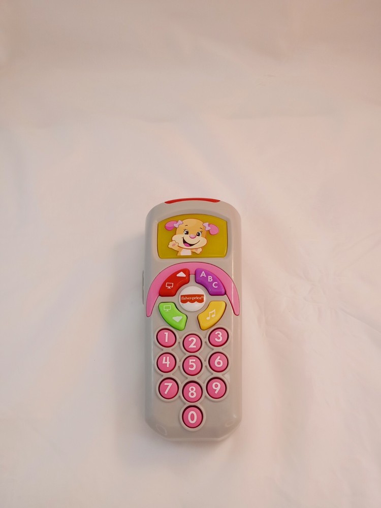 Fisher Price Laugh and Learn Puppy's Remote Baby Toy 35+ Songs & Sounds 6-36 M