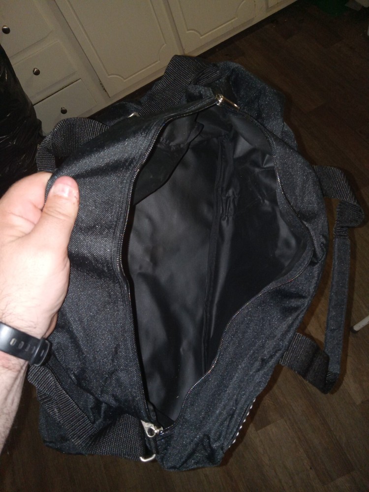 Black Soft-Sided Zippered Carry-On Bag with Convenient Front Pockets