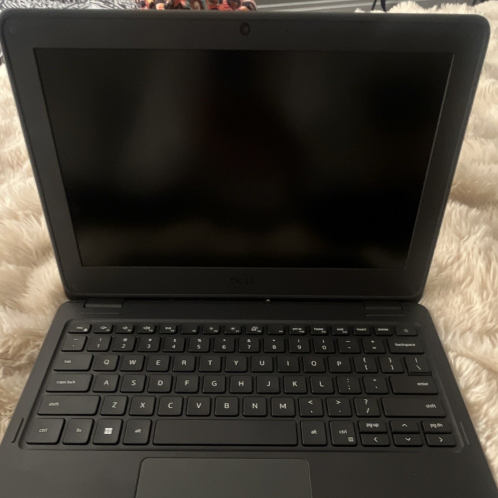 Dell Black Notebook Laptop with Power Adapter Included - Sleek Portable Computer