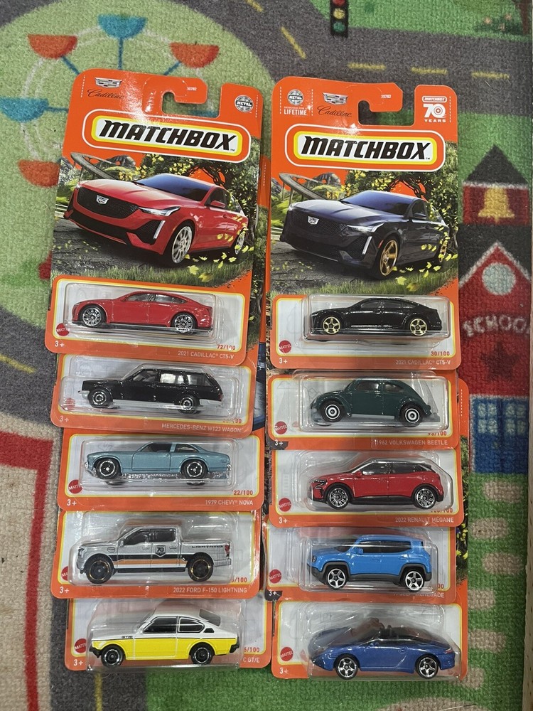 MATCHBOX MIXED LOT 10 OF DIECAST CARS /TRUCKS ALL CARDED 1/64 LT1