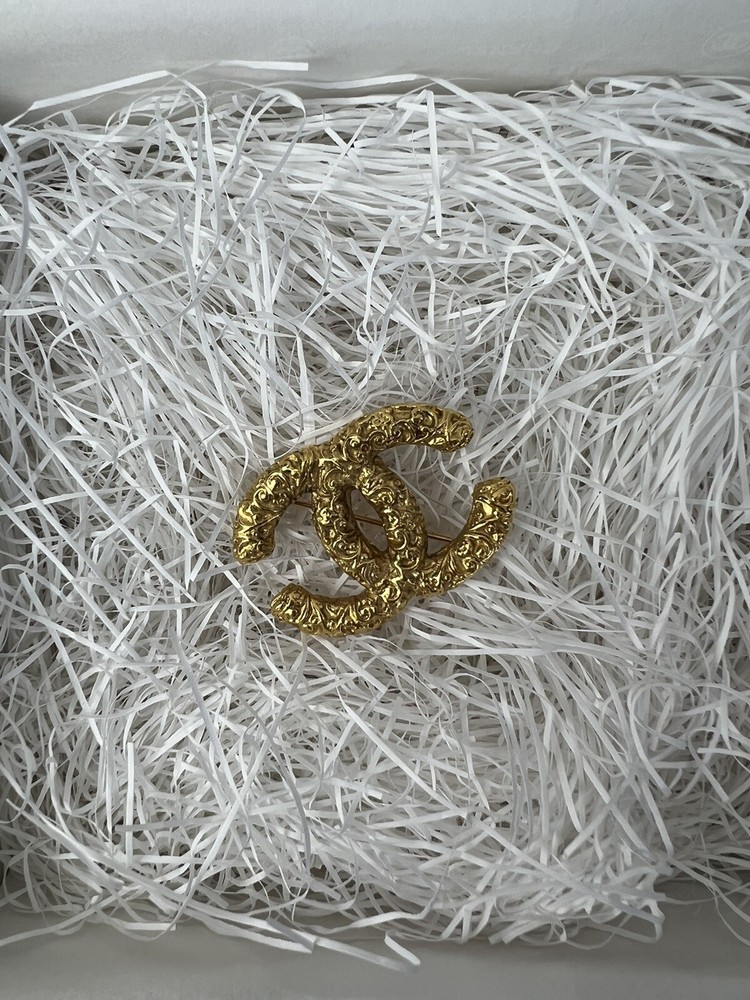 CHANEL Coco Mark Brooch in Luxurious Gold Tone  