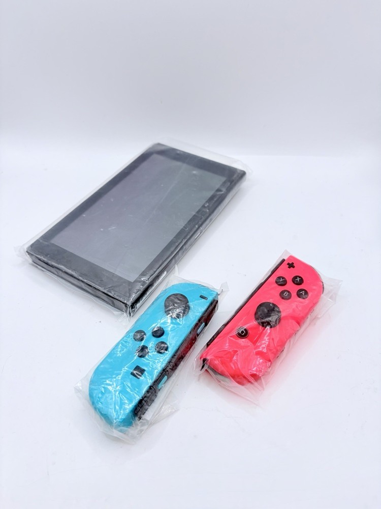 Nintendo Switch Console Tablet + Joy-Con Controllers Neon Red Blue NEW