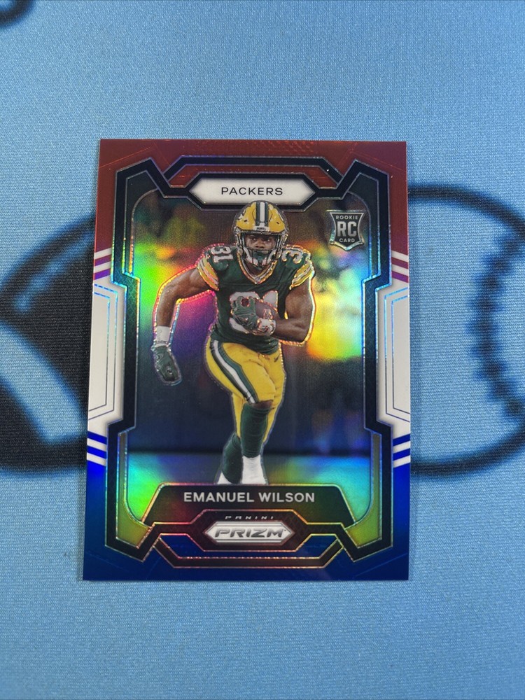 EMANUEL WILSON 2023 PRIZM RED WHITE BLUE RC MINT! PACKERS