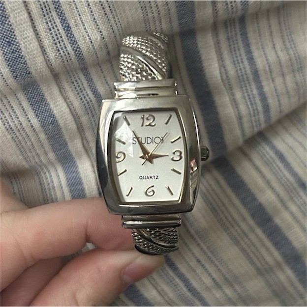 Studio Women's Silver Bangle Quartz Analog Dress Wristwatch White Dial