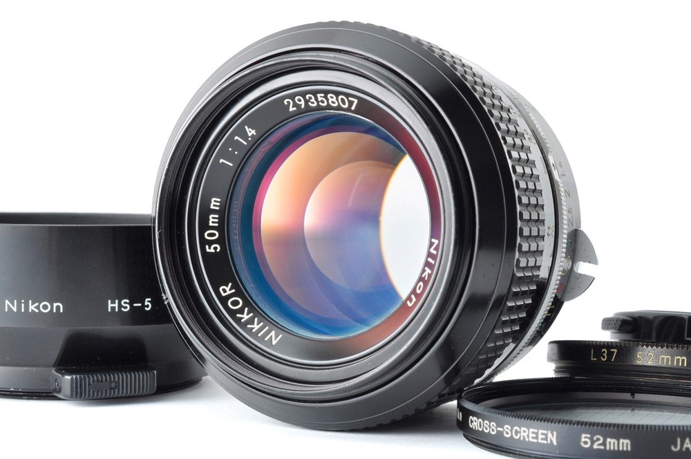 Nikon New NIKKOR 50mm f/1.4 Non-Ai MF Standard Prime Lens w/ Hood & 2 Filters