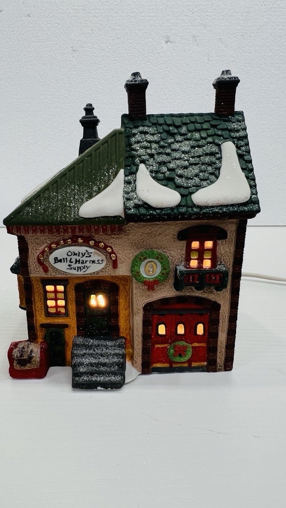 Dept 56 North Pole Series “Orly’s Bell Harness Supply”  56219 Retired Excellent