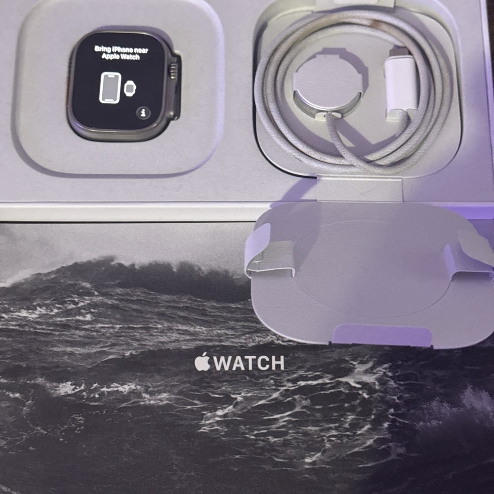 Unlocked Apple Watch Ultra 49mm Titanium Case with Midnight Ocean Band(GPS+Cell)Watch Is Unlocked And Has Cellular And GPS.