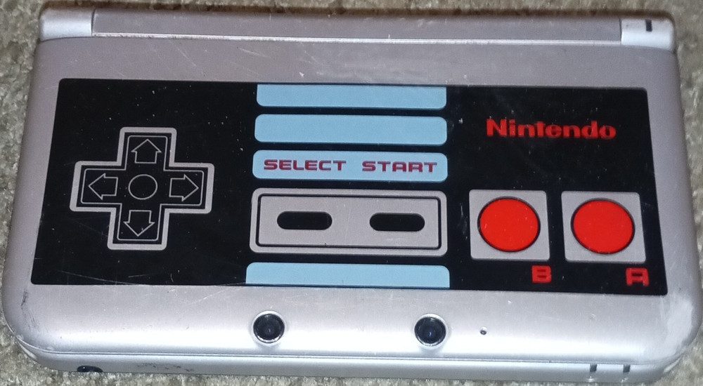 Nintendo 3DS XL NES Edition w/ Super Smash Bros. NES Controller Design