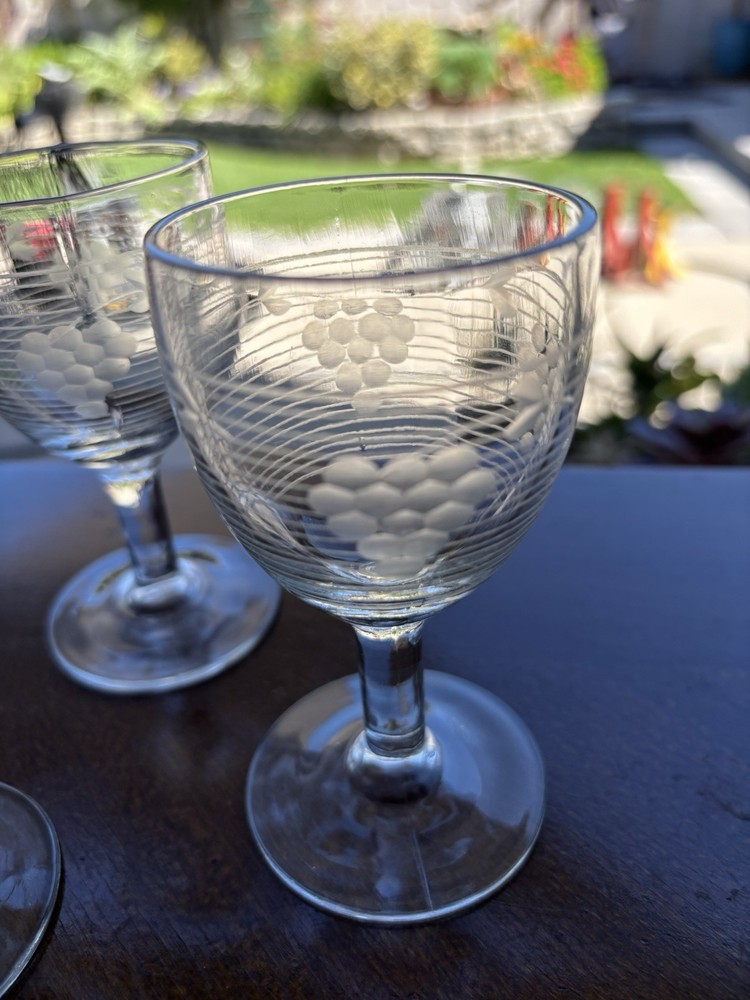 Vintage depression Era cordial glasses feature a 