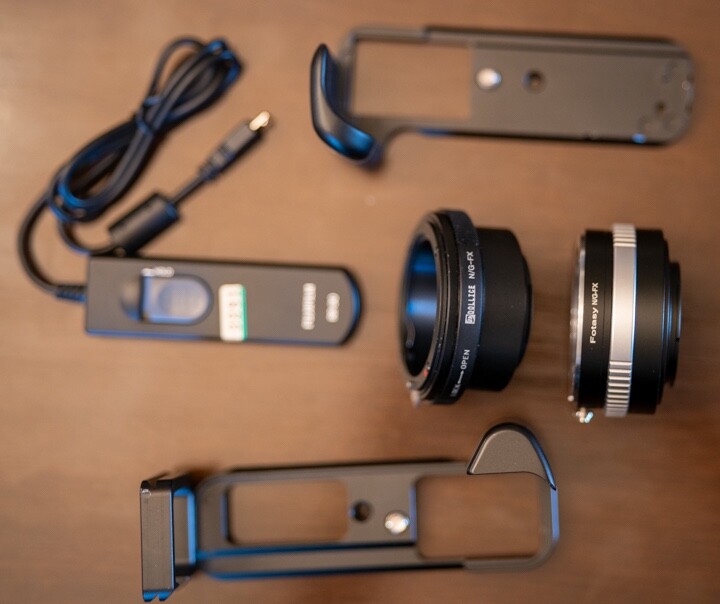 Fuji X-T30 accessories including grips lens adapters and wired remote