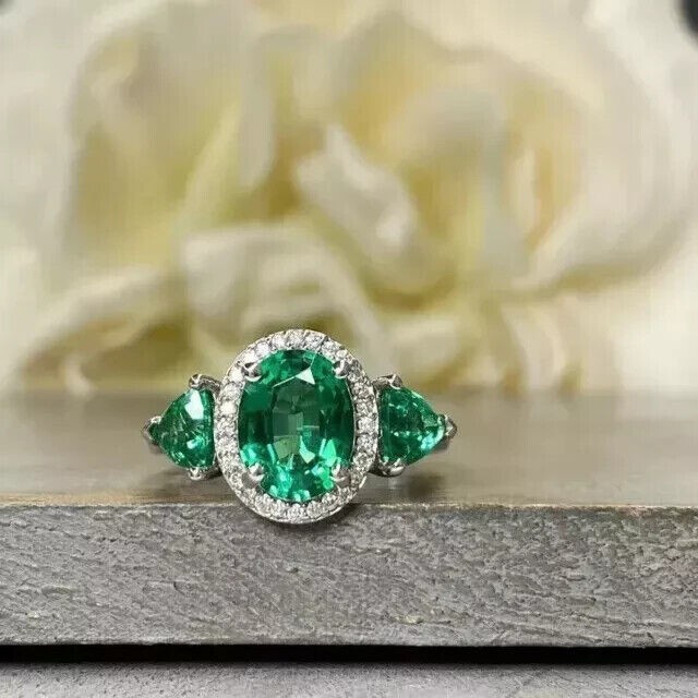 2.20Ct Oval Green Simulated Emerald Halo Wedding Ring in 14k White Gold Plated