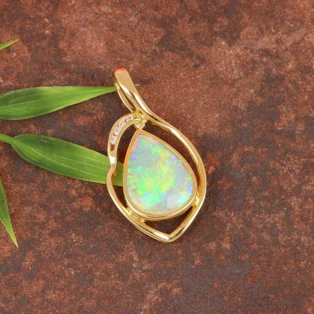 2Ct Pear Cut Lab Created Opal Women's Pendant 14K Yellow Gold Plated Free Chain
