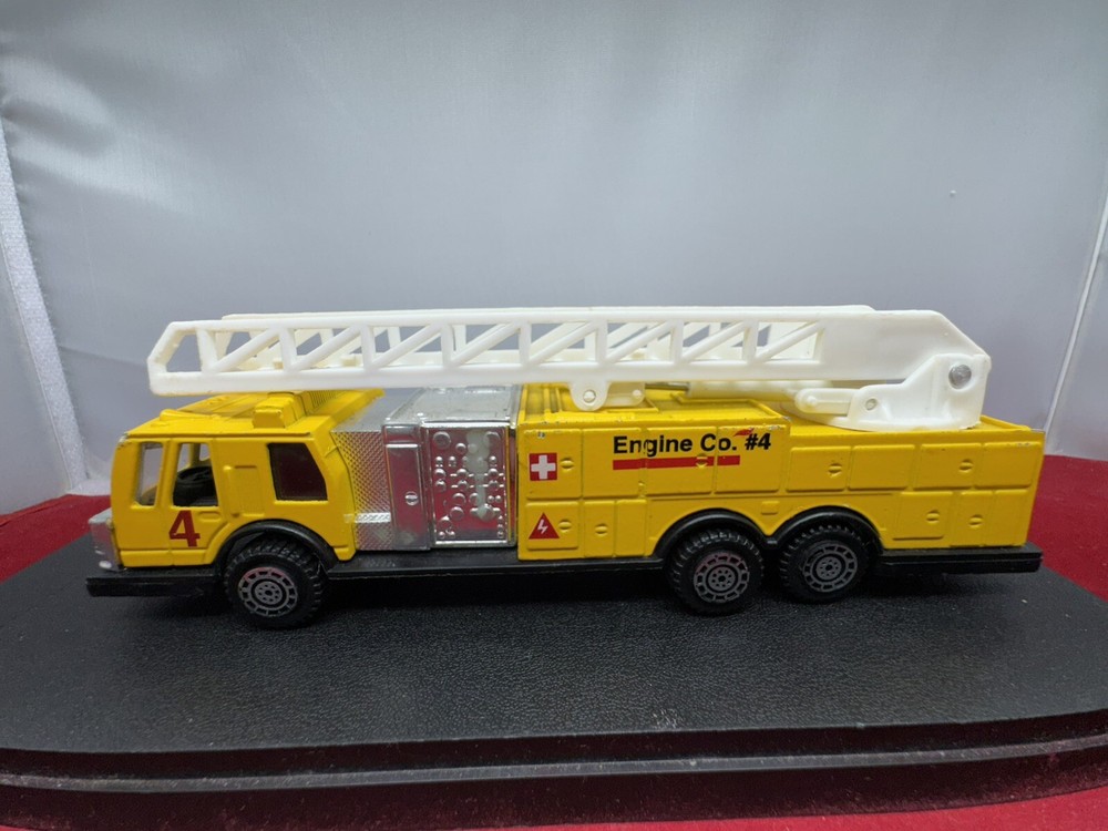 Bright Yellow Diecast TootsieToy Firetruck Metal Plastic Toy