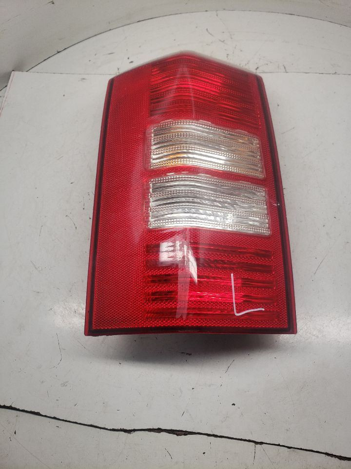 Upgrade your 2008-2017 Jeep Patriot with this high-quality Driver Side Left Tail Light Assembly (Part #1298755) – perfect fit, durable design, and enhanced visibility for safer driving.