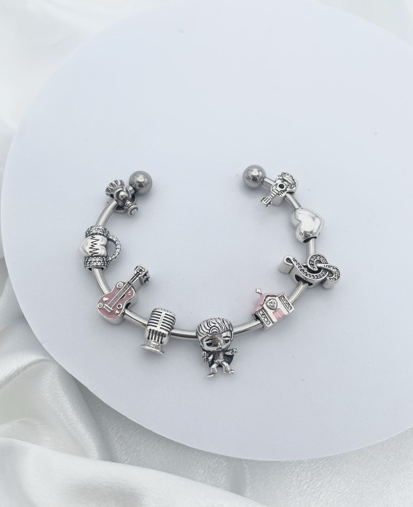 Linx Stainless Steel Bangle with Elvis Presley Themed Charms